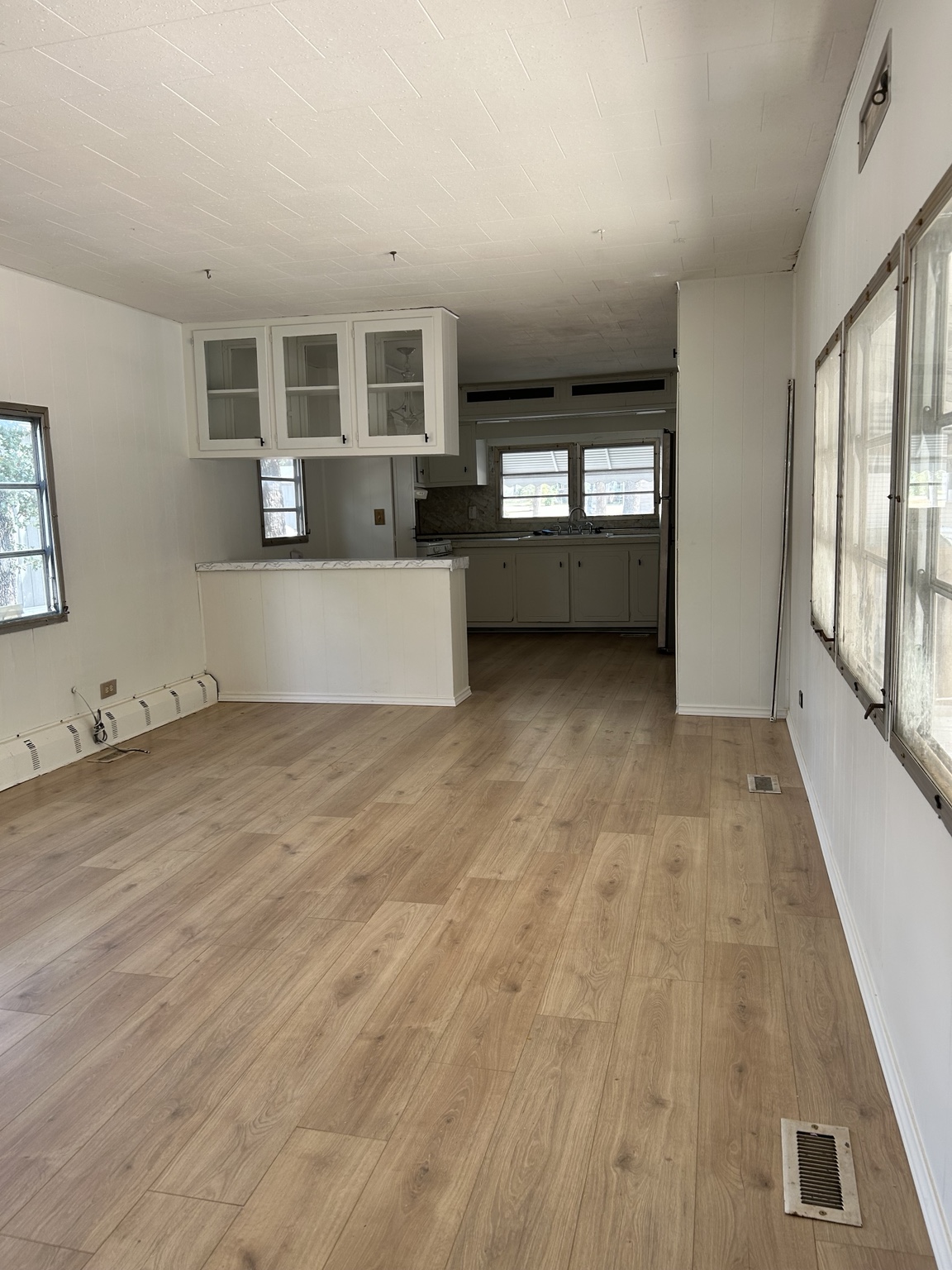 Living room toward kitchen wide view thumbnail